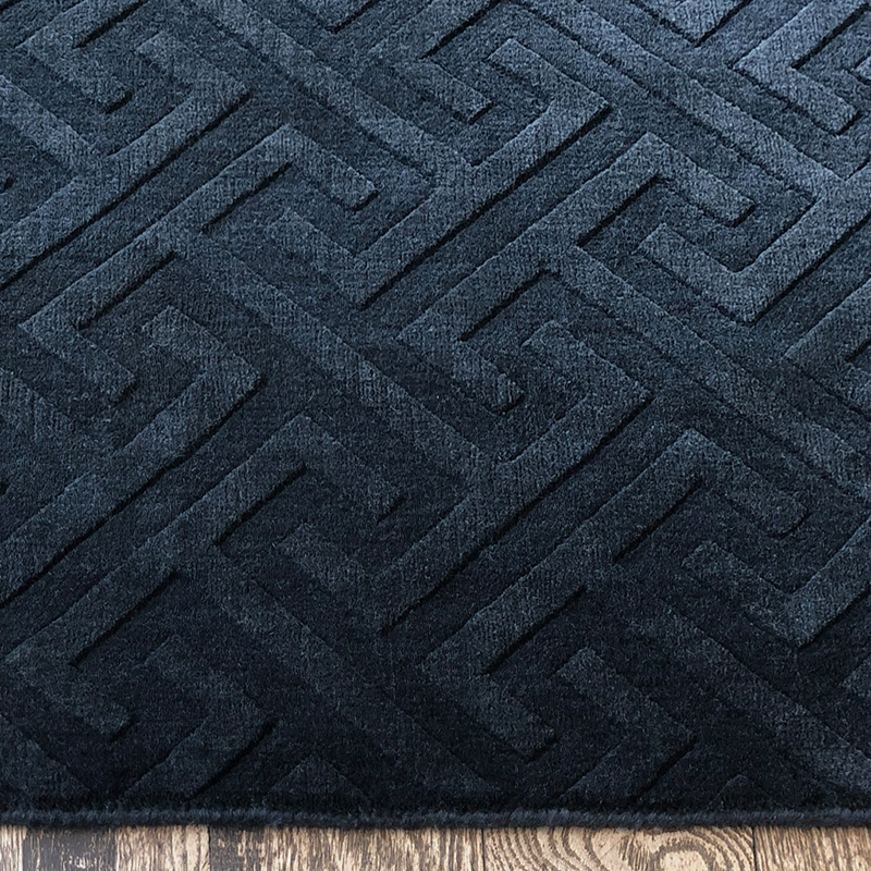 carved navy rug